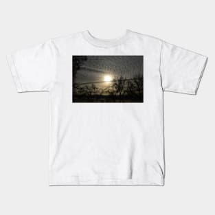 Crossing a line in our sky's Kids T-Shirt